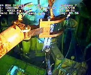 BP works to replace cap over gushing well in the Gulf