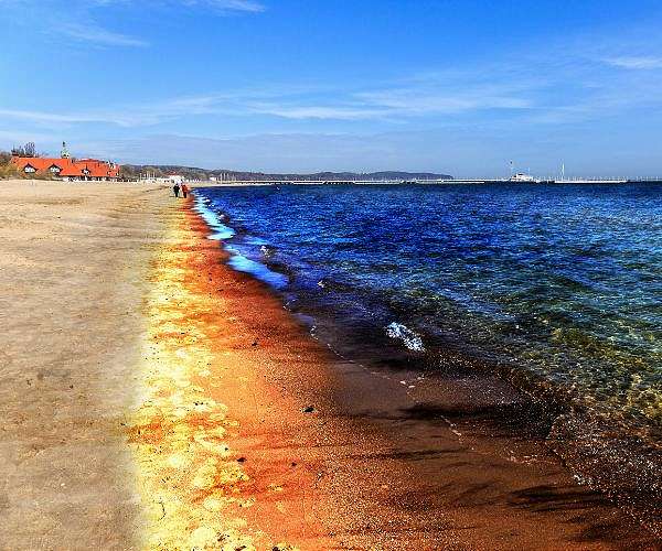 Russians take Epiphany dip in waters hit by oil spill