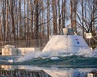 Orion spacecraft recovery practiced at sea