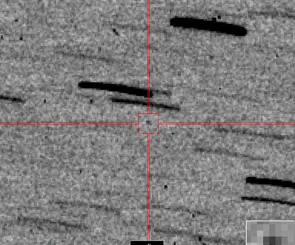 First view of OSIRIS-REx returning with asteroid sample