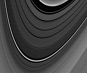 Cassini Sees Saturn Rings Oscillate Like Mini-Galaxy