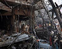 Pakistan bomb kills 92 as Clinton visits