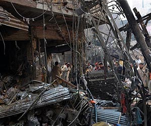 Pakistan market bomb toll rises to 34