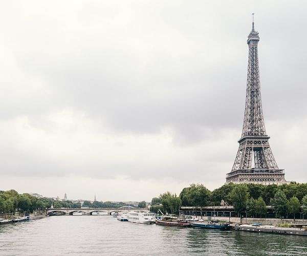 France celebrates national day as political crisis rumbles on