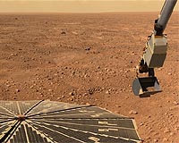 NASA's Phoenix Mars Lander Inspects Delivered Soil Samples