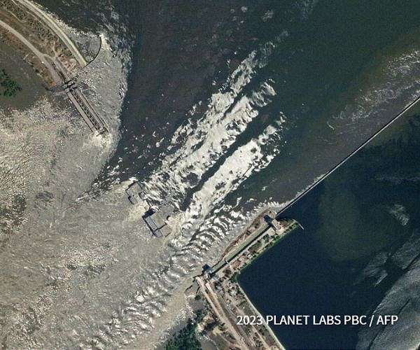 Ukraine, Russia say thousands evacuated from dam flooding
