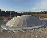 How to inflate a hardened concrete shell with a weight of 80 tons