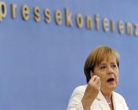 Merkel says arms aid for Iraqi Kurds also defends Europe