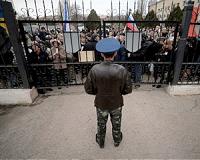 Crimean militias storm bases, arrest Ukraine navy chief