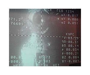 Russian supply ship docks with orbiting space station