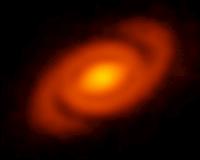 Spiral Arms Embrace Young Star