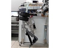 Bio-inspired lower-limb 'wearing robotic exoskeleton' for human gait rehab