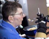 Quadriplegic man regains use of arm in medical first: study