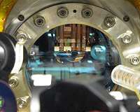 Testing quantum field theory in a quantum simulator