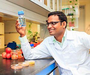 NUS researchers developed world's first water treatment techniques using apple and tomato peels