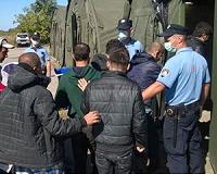 Bosnia arrests Syrian, Algerian migrants with weapons