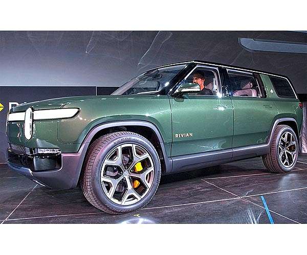 Electric vehicle maker Rivian raises another $2.5 bn