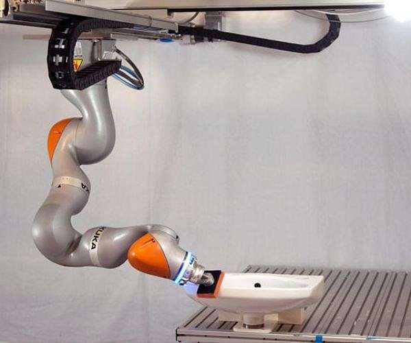 Robot learns flexible cleaning skills by observing humans