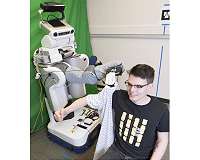 Robot teaches itself how to dress people