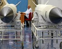 Russia warns could halt foreign arms checks