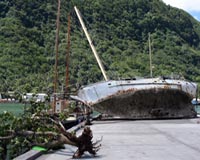At least 113 dead as Pacific quake, tsunami flatten villages