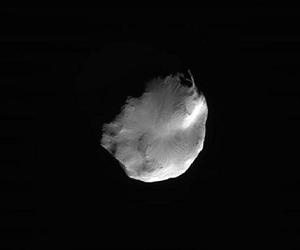 Cassini Sends Back Postcards Of Saturn Moons