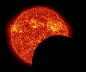 NASA's SDO Observes Earth, Lunar Transits in Same Day