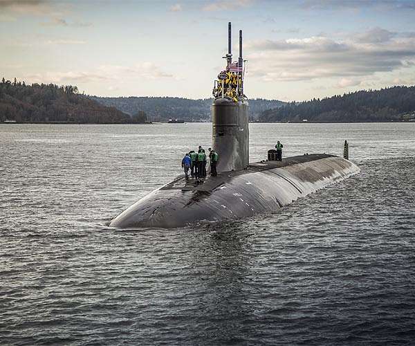 Trump deploys nuclear submarines in row with Russia