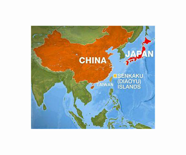 Japan PM pledges to boost military capacity