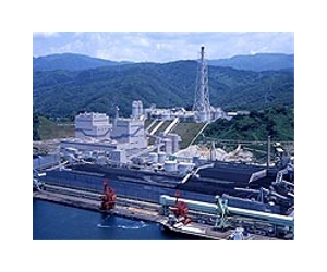 Japan utility suspends nuclear expansion after crisis