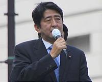 Japan's Abe vows support for victims after quake injures 41