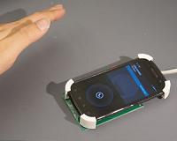 Reflected smartphone transmissions enable gesture control