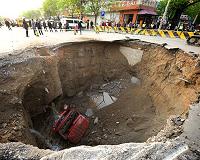 Huge sinkhole swallows bus, kills six in China