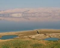 Swimmers worth their salt cross shrinking Dead Sea