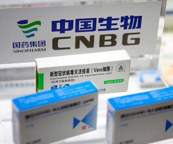China approves first mixed-vaccine trial as Delta spreads