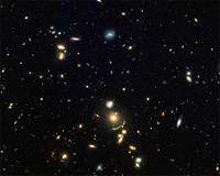 Hubble Spots a Green Cosmic Arc