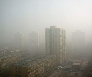 Factory smoke clouds China pollution pledges