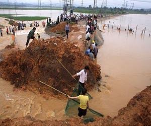 China floods threaten ancient capital as more rain forecast