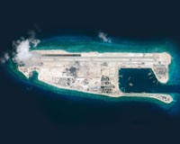 China to hold drills in disputed waters ahead of court ruling
