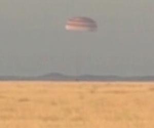 ISS crew returns safely to Earth with Olympic torch
