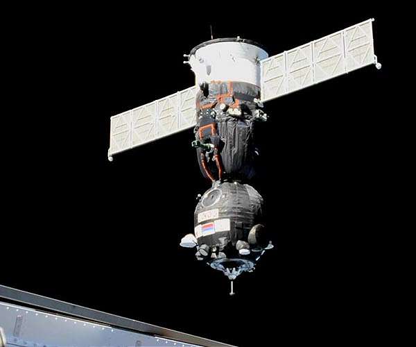 Three-man Russian crew launches, headed to ISS