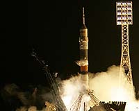 Soyuz Lofts First Malaysia And First Female ISS Commander Into Orbit