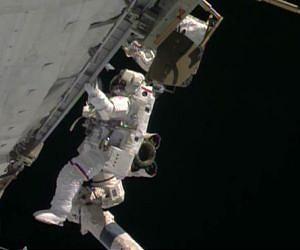 NASA astronauts step out on Christmas Eve spacewalk