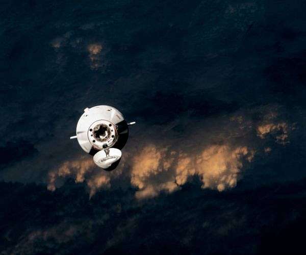 ISS Crew unloads latest research kits after Dragon Cargo docking