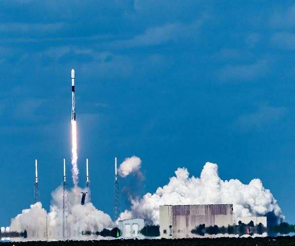 SpaceX launches 40 OneWeb internet satellites, lands booster