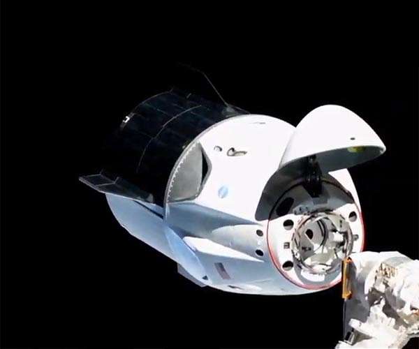 SpaceX Crew Dragon that will take Starliner astronauts home docks at ISS