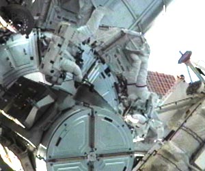Astronauts Complete Spacewalk; Cargo Transfers Begin