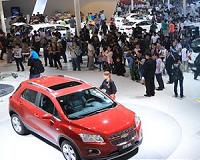 Global carmakers show off SUVs, electrics as China pledges reforms