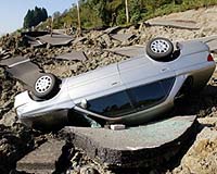 In quake-prone Japan, preparation and wealth save lives
