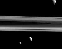 Tethys, Janus pose with Saturn's rings in new NASA photo